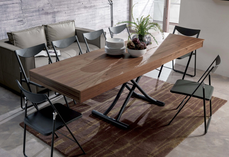 Illustration for article titled Transforming Coffee Table Just Keeps Getting Bigger and Bigger